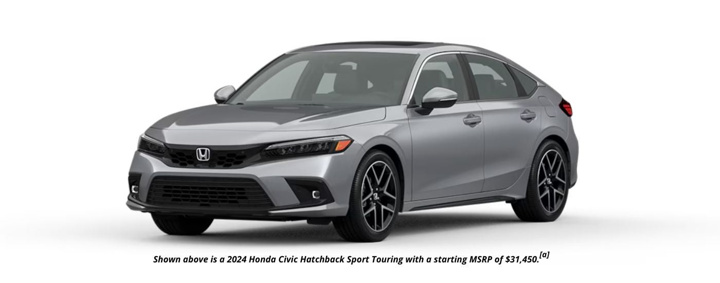 A grey 2024 Honda Civic Hatchback Sport Touring is shown angled left.
